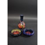 MOORCROFT POMEGRANATE including a pomegranate bottle shaped vase (16cms high), a small pomegranate