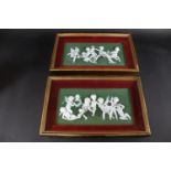 PAIR OF WEDGWOOD STYLE FRAMED PLAQUE a pair of green plaques with a variety of cherub figures in