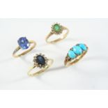 A TURQUOISE AND DIAMOND RING the three turquoise cabochons are set with rose-cut diamond highlights,