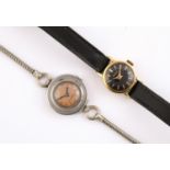 A LADY'S GOLD WRISTWATCH BY GUBELIN the signed black dial with baton numerals, numbered to the