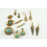 A PAIR OF VICTORIAN GOLD AND TURQUOISE DROP EARRINGS mounted with graduated circular turquoise