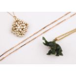 A JADE ELEPHANT PENDANT on a 9ct gold circular link chain, together with cultured pearl pendant