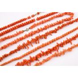 A SIX ROW CORAL NECKLACE 43cm long, together with five other coral necklaces and a coral bracelet,