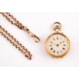 AN 18CT GOLD OPEN FACED POCKET WATCH the foliate engraved white enamel dial with Roman numerals,