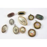 A QUANTITY OF ASSORTED ANTIQUE BROOCHES AND PENDANTS