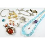 A QUANTITY OF JEWELLERY including a pair of red enamel drop earrings, an amber and silver pendant,