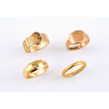 A 9CT GOLD BUCKLE RING with embossed foliate decoration, 3.7 grams, size S 1/2, together with a