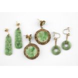 A PAIR OF JADE DROP EARRINGS of rounded rectangular shape with carved and pierced decoration, with