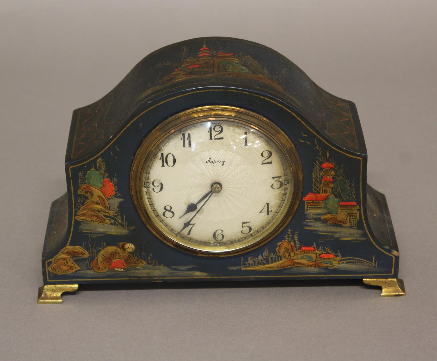 A CHINOISERIE LACQUERED MANTEL CLOCK, the 3.5" dial with enamelled Arabic numerals and signed