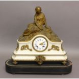 A FRENCH WHITE MARBLE AND ORMOLU MANTEL CLOCK, depicting a maiden seated on a rocky outcrop above