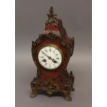 A FRENCH BOULLE MANTEL CLOCK, the 3 3/4" enamelled dial on an eight day brass movement striking half