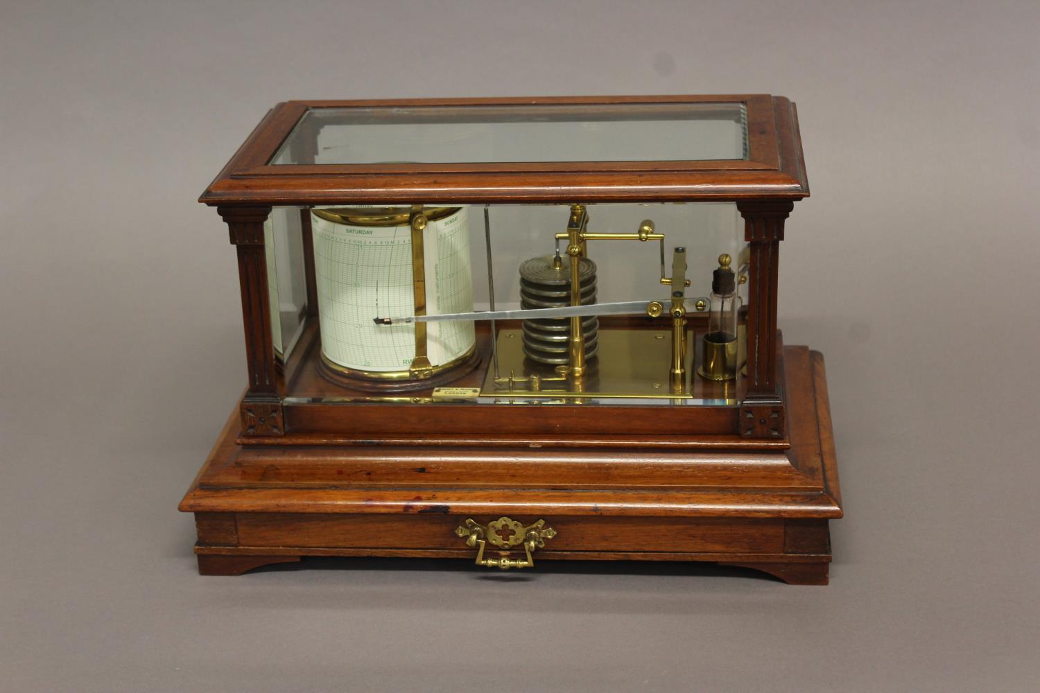 A BAROGRAPH BY SHORT & MASON OF LONDON, gilt metal with silvered bellows, in a mahogany case with