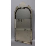 A VENETIAN STYLE ARCH TOPPED WALL MIRROR, 18th century and later, the multi-plate bevel edged wall