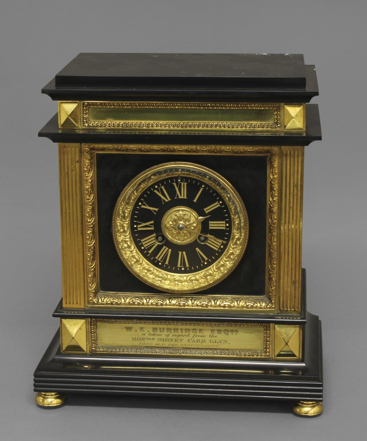 A 19TH CENTURY FRENCH BLACK SLATE AND GILT MANTEL CLOCK, the 4" black and gilt dial on an eight