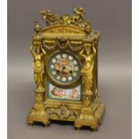 A 19TH CENTURY FRENCH GILT AND PORCELAIN MOUNTED MANTEL CLOCK, the 3.5" porcelain dial decorated