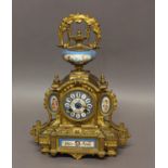 A 19TH CENTURY FRENCH GILT AND PORCELAIN MOUNTED MANTEL CLOCK, the 3" porcelain dial with floral