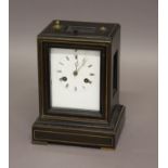 AN EBONISED MANTEL CLOCK, the enamelled dial signed Lewis & Son on a brass eight day movement