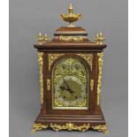 AN OAK CASED WINTERHALDER & HOFFMEIER BRACKET CLOCK, the 6 3/4" dial with silvered chapter ring