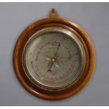AN OAK CASED ANEROID BAROMETER, the silvered dial signed J. Hicks, Maker, London, 10252, diameter