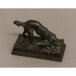 AFTER ANTOINE-LOUIS BARYE, a patinated bronze study of a spaniel and mallard, on a naturalistic
