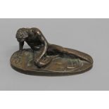 AFTER THE ANTIQUE; 'The Dying Gaul', a 19th century cast and patinated bronze study of a slumped