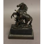 AFTER GUILLAUME COUSTOU (FRENCH, 1667-1746), a 19th century bronze study of the Marley Horse rearing