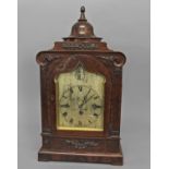 AN EARLY VICTORIAN BRACKET CLOCK BY CUNLIFF OF LIVERPOOL, the silvered arch-topped dial with
