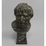 AFTER THE ANTIQUE, a 19th century cast and patinated bronze bust after the antique of 'Pseudo-
