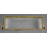 A GEORGE II GILTWOOD OVERMANTEL MIRROR, with foliate carved decoration and side brackets with