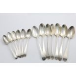 SEVEN VARIOUS GEORGE III OLD ENGLISH PATTERN TABLE SPOONS each initialled, by mixed makers, mixed