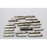 POCKET FRUIT KNIVES: A collection of twenty silver and mother of pearl examples, mostly Sheffield