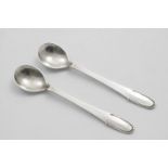 BY GEORG JENSEN: A PAIR OF EARLY 20TH CENTURY DANISH BEADED (KUGLE) PATTERN CONDIMENT SPOONS with