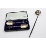 A CASED PAIR OF DUTCH SPOONS with sailing ship terminals and English import marks for Chester