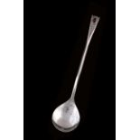 A GEORGE V IRISH ARTS AND CRAFTS SPOON with a drop-shaped bowl and a carved faceted stem, fluted