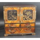 LARGE JAPANESE KODANSU TABLE CABINET a large wooden table cabinet with lacquer panel doors decorated