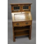 ARTS & CRAFTS OAK BUREAU - STORY & TRIGGS of small proportions, made in oak with copper hinges and