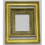 TWO PICTURE FRAMES to comprise a frame of late 18th Century English type, to fit 48 x 38cm.; and