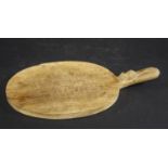ROBERT THOMPSON OF KILBURN - 'MOUSEMAN' CHEESE BOARD on oval shaped cheese board, made in oak and