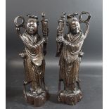 PAIR OF CHINESE CARVED WOODEN FIGURES late 19thc, a pair of carved hardwood figures with silver