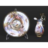 VIENNESE MINIATURE ENAMEL JUG & SAUCER a small enamel jug and saucer, each painted with a