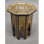 MOORISH OCTAGONAL TABLE an octagonal shaped table, the top inlaid with mother of pearl and various