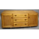 ERCOL SIDEBOARD Model No 455, a light elm sideboard with three central drawers (one with cutlery)