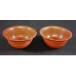 PAIR OF CHINESE CORAL BOWLS a pair of coral ground bowls with a flared rim and straight foot, each