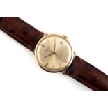 A GENTLEMAN'S SWISS 9CT GOLD WRISTWATCH BY ORIOSA the signed gold coloured dial with baton numerals,