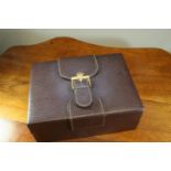 A BURGANDY LEATHER BOX FOR A ROLEX WRISTWATCH 15. x 19.5cm