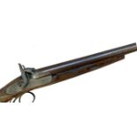 A DOUBLE BARREL MUZZLE LOADING SHOTGUN. A 19th Century double barrel shotgun with twin side-by-