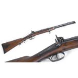 A FINE MID 19TH CENTURY JACOBS RIFLE BY SWINBURN AND SONS. A fine rifle with twin 59cm blued