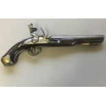 A 19TH CENTURY FLINTLOCK PISTOL. With a 23cm circular tapering barrel stamped with twin proof marks,