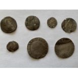 A COLLECTION OF ELIZABETH I HAMMERED SILVER COINS. An Elizabeth I Shilling, rose behind crowned