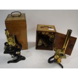 CASED MICROSCOPE - DOLLAND a brass and metal monocular microscope, marked Dolland, Ludgate,